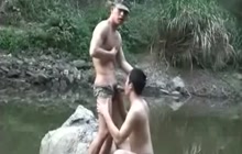Asian boys fucking by a river